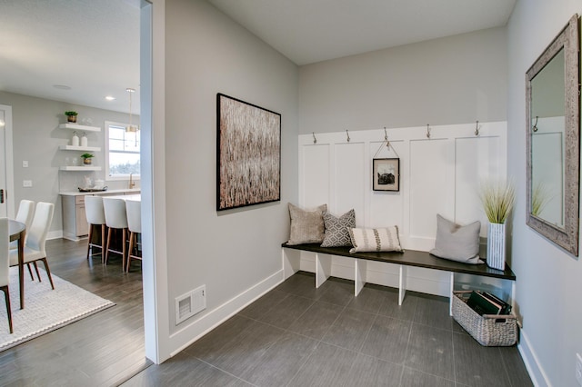 18210 102nd Pl N, Maple Grove, MN 55311 - mudroom with baseboards and recessed lighting