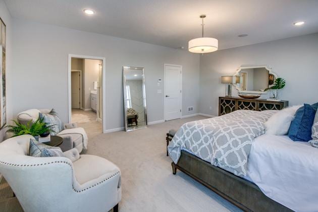 18210 102nd Pl N, Maple Grove, MN 55311 - bedroom with light carpet, ensuite bath, and recessed lighting