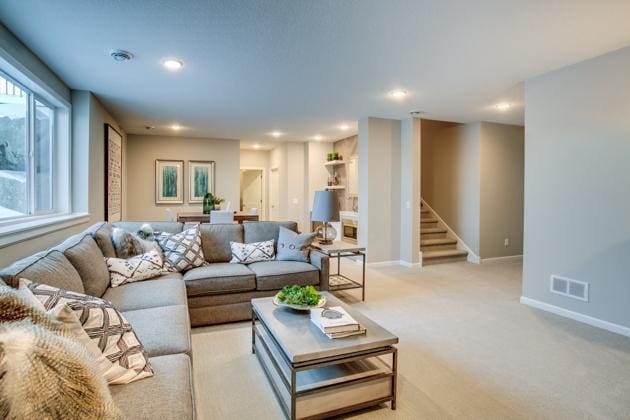18210 102nd Pl N, Maple Grove, MN 55311 - living room with stairway, recessed lighting, and light carpet