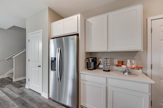 17021 Draper Way, Lakeville, MN 55044 - kitchen with stainless steel refrigerator with ice dispenser, wood finished floors, and white cabinetry
