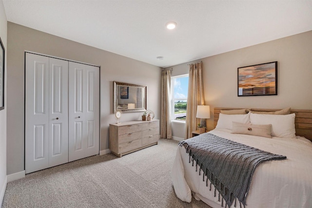 17021 Draper Way, Lakeville, MN 55044 - bedroom with light colored carpet and a closet