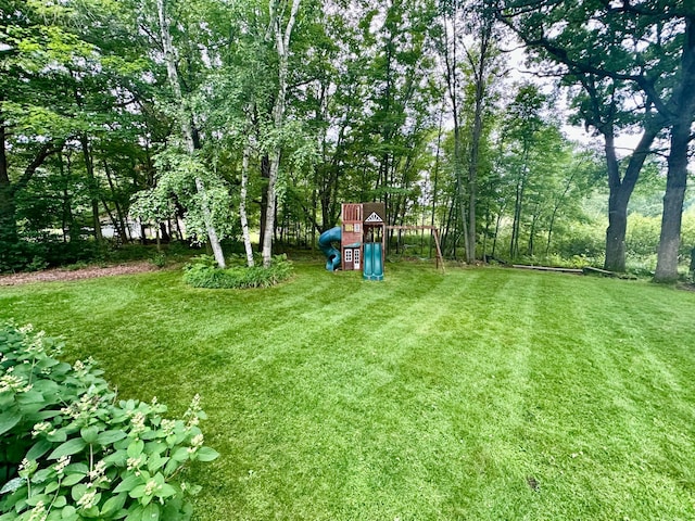 18224 Flanders St NE, East Bethel, MN 55092 - view of grassy yard featuring a playground
