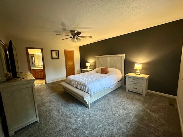 18224 Flanders St NE, East Bethel, MN 55092 - bedroom with carpet flooring, connected bathroom, ceiling fan, and a textured ceiling