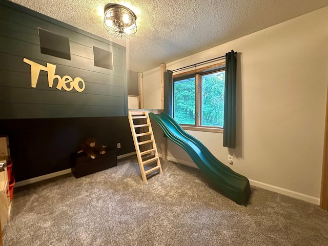 18224 Flanders St NE, East Bethel, MN 55092 - carpeted bedroom with a textured ceiling and baseboards