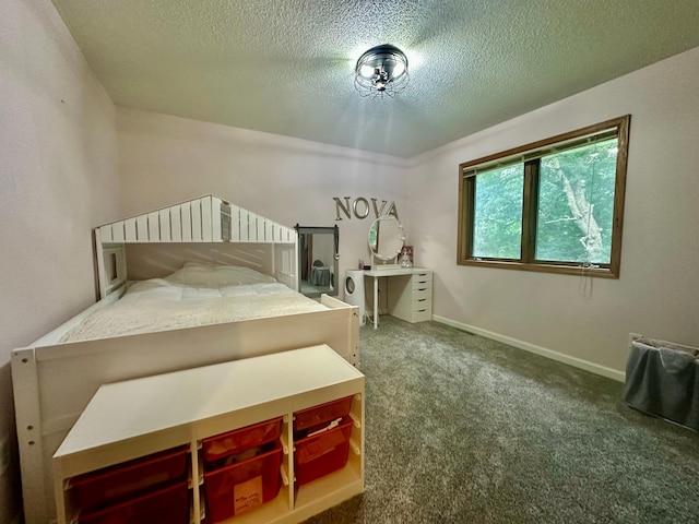 18224 Flanders St NE, East Bethel, MN 55092 - carpeted bedroom with a textured ceiling and baseboards