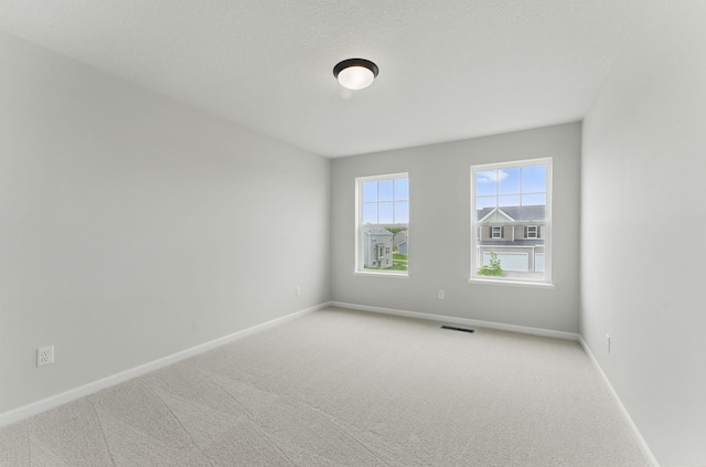 19391 Clearwater Loop, Farmington, MN 55024 - carpeted spare room featuring baseboards