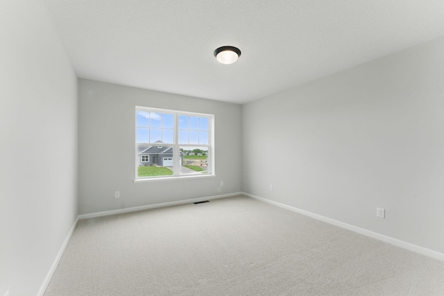 19391 Clearwater Loop, Farmington, MN 55024 - spare room featuring carpet floors and baseboards