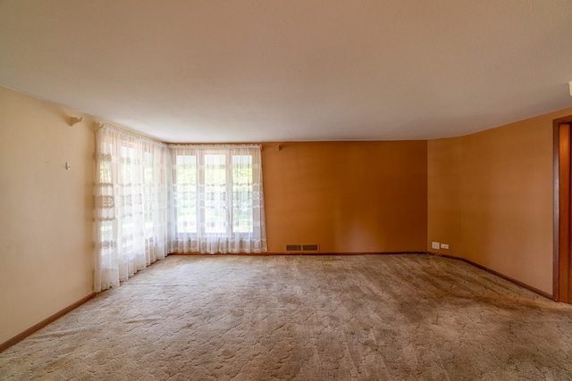 208 Lincoln St SW, Mapleton, MN 56065 - empty room with carpet and baseboards