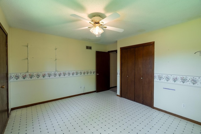 208 Lincoln St SW, Mapleton, MN 56065 - unfurnished bedroom featuring a closet and ceiling fan
