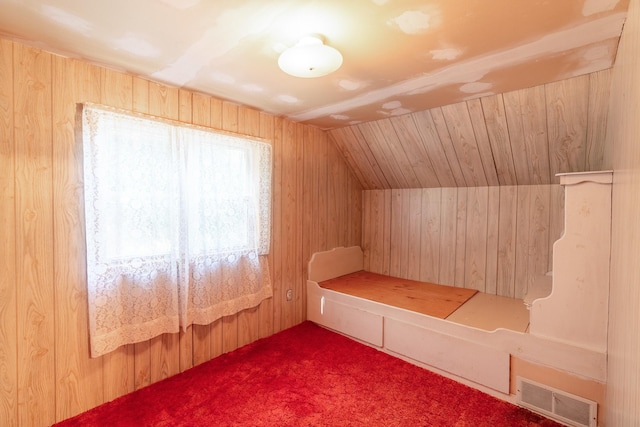 208 Lincoln St SW, Mapleton, MN 56065 - additional living space with wooden walls, carpet, and lofted ceiling