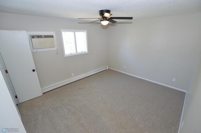 418 17th Ave N, Wahpeton, ND 58075 - carpeted spare room featuring baseboard heating, ceiling fan, a textured ceiling, and an AC wall unit