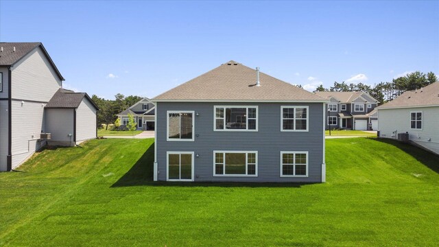 14990 144th Ave N, Dayton, MN 55327 - rear view of property featuring a yard
