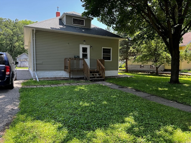 226 Central Ave, Truman, MN 56088 - view of front of home featuring a front lawn and roof with shingles