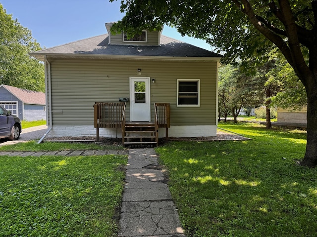 226 Central Ave, Truman, MN 56088 - bungalow with a front yard and roof with shingles