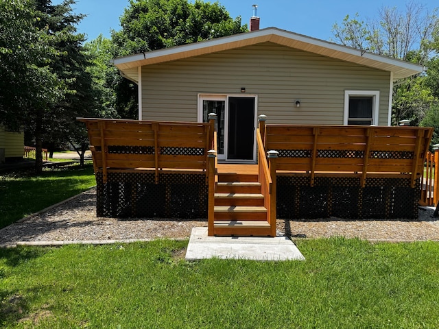 226 Central Ave, Truman, MN 56088 - back of property with a wooden deck and a yard