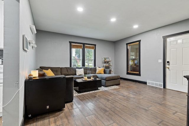 205 Main St, Marshall, MN 56258 - living room with recessed lighting and wood finished floors