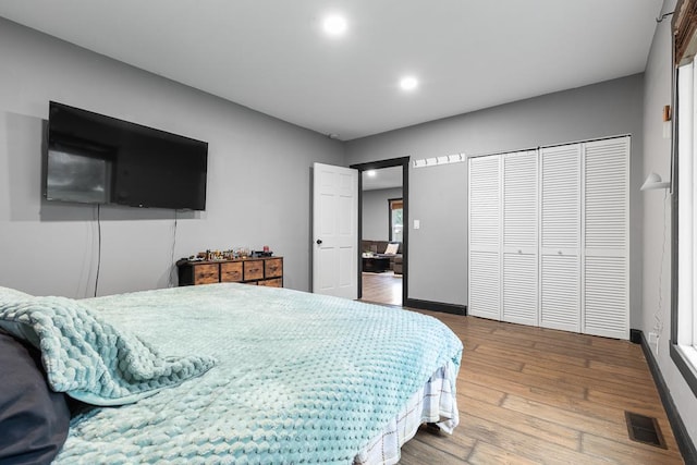 205 Main St, Marshall, MN 56258 - bedroom with wood finished floors, recessed lighting, and a closet