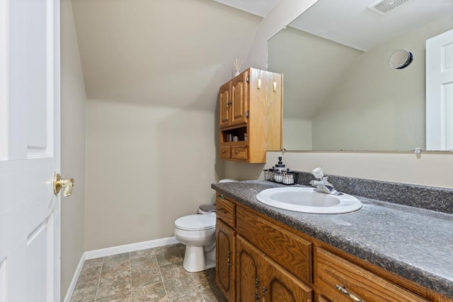 205 Main St, Marshall, MN 56258 - bathroom with vanity and vaulted ceiling