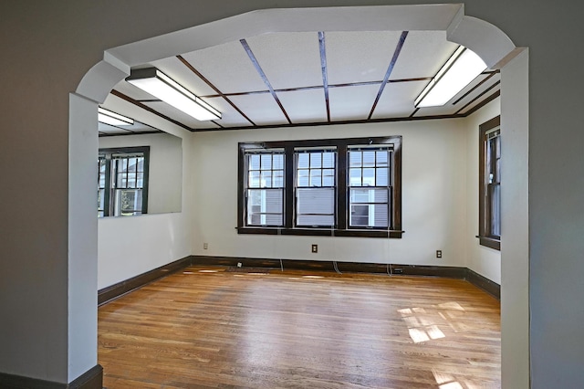 4623 Blaisdell Ave S, Minneapolis, MN 55419 - spare room featuring wood finished floors and arched walkways