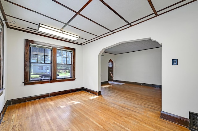 4623 Blaisdell Ave S, Minneapolis, MN 55419 - spare room featuring arched walkways and wood finished floors