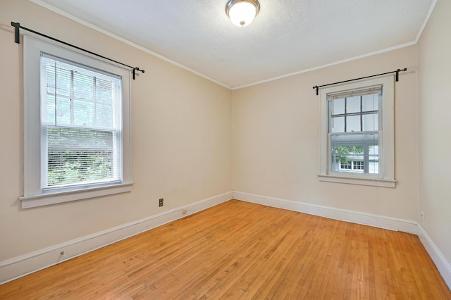 4623 Blaisdell Ave S, Minneapolis, MN 55419 - spare room featuring healthy amount of natural light, light wood-style floors, and ornamental molding