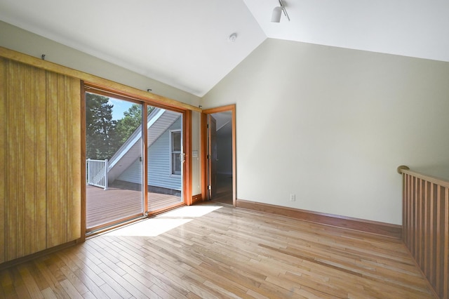4623 Blaisdell Ave S, Minneapolis, MN 55419 - empty room featuring light wood finished floors and vaulted ceiling