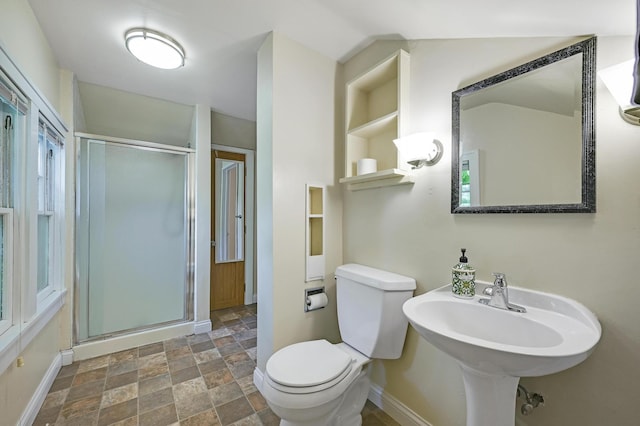 4623 Blaisdell Ave S, Minneapolis, MN 55419 - bathroom featuring stone finish flooring, a stall shower, and built in shelves