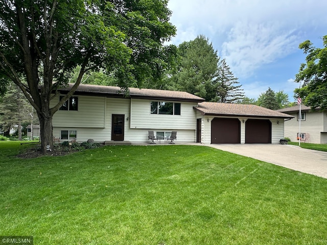 320 Ramey Rd, Maple Lake, MN 55358 - split foyer home with an attached garage, driveway, and a front yard