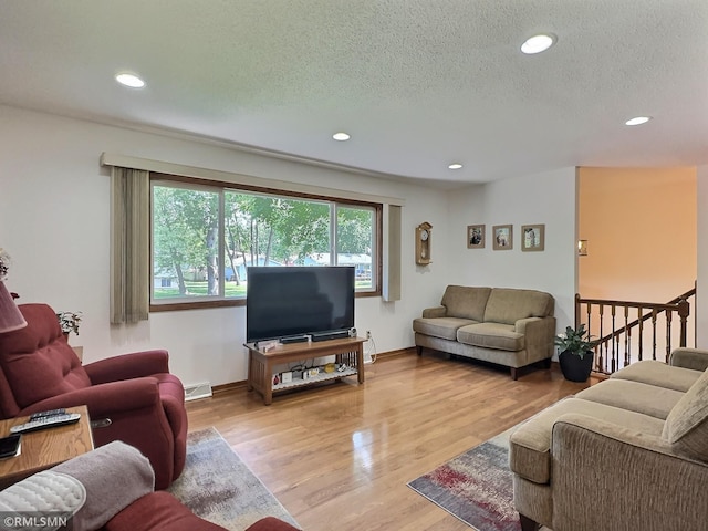 320 Ramey Rd, Maple Lake, MN 55358 - living area with recessed lighting, a textured ceiling, and wood finished floors