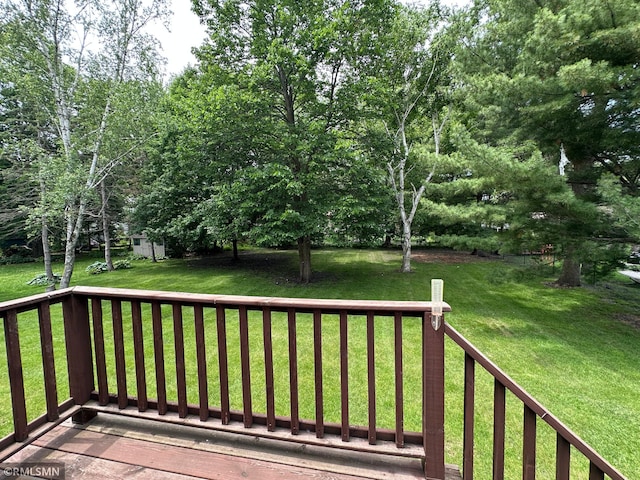 320 Ramey Rd, Maple Lake, MN 55358 - wooden terrace featuring a lawn and an outbuilding