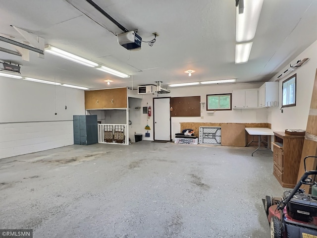 320 Ramey Rd, Maple Lake, MN 55358 - garage featuring a garage door opener