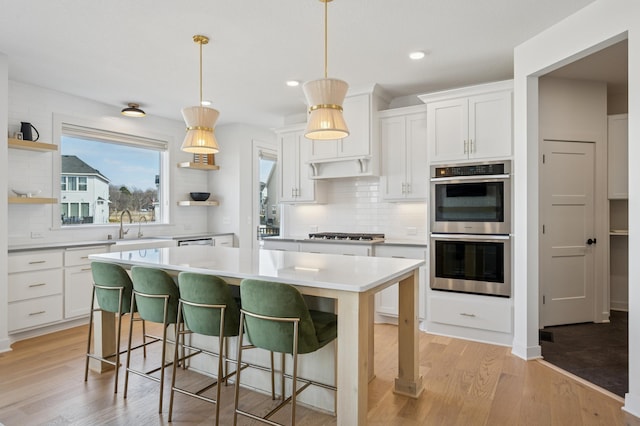 2348 Kester Ave NE, Saint Michael, MN 55376 - kitchen with open shelves, appliances with stainless steel finishes, backsplash, light countertops, and recessed lighting