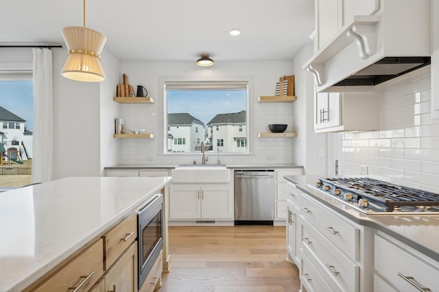 2348 Kester Ave NE, Saint Michael, MN 55376 - kitchen with appliances with stainless steel finishes, open shelves, and decorative backsplash