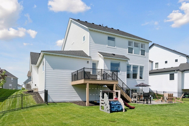 2348 Kester Ave NE, Saint Michael, MN 55376 - rear view of property with a fenced backyard, a deck, a patio area, stairs, and a shingled roof