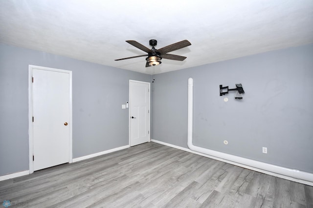 1253 3rd St N, Fargo, ND 58102 - spare room featuring wood finished floors and ceiling fan