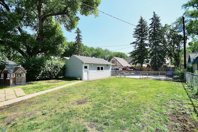 1253 3rd St N, Fargo, ND 58102 - fenced backyard with a storage shed