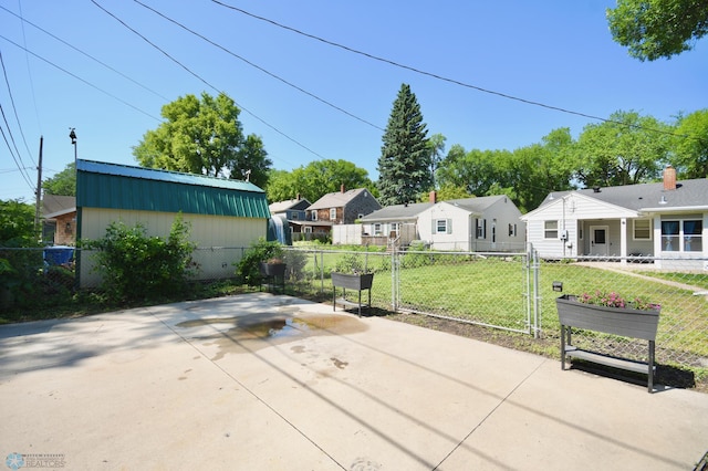 1253 3rd St N, Fargo, ND 58102 - view of patio featuring a residential view