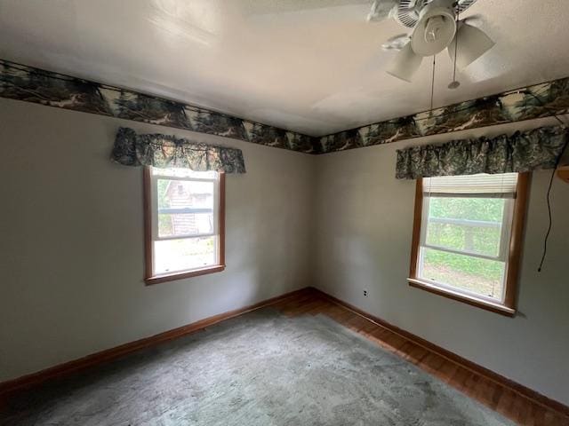 2750 330th St, Sterling Twp, WI 54840 - empty room with ceiling fan and wood finished floors