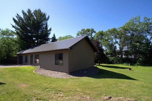 1001 3rd St SW, Crosby, MN 56441 - view of side of property with a lawn, a metal roof, and a standing seam roof