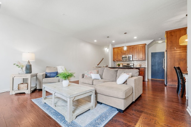 7742 Madelyn Creek Dr, Victoria, MN 55386 - living area featuring dark wood-style flooring and recessed lighting