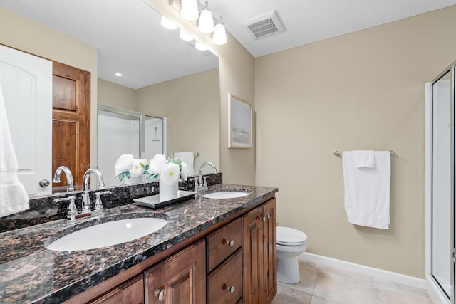 7742 Madelyn Creek Dr, Victoria, MN 55386 - full bath with double vanity, a shower stall, and tile patterned floors