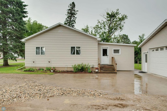 604 2nd Ave S, Kindred, ND 58052 - rear view of property with a garage