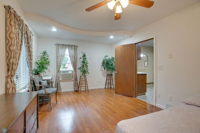 604 2nd Ave S, Kindred, ND 58052 - bedroom with cooling unit, light wood finished floors, recessed lighting, and ceiling fan