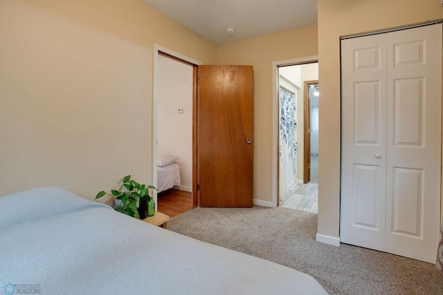 604 2nd Ave S, Kindred, ND 58052 - bedroom with carpet flooring and a closet