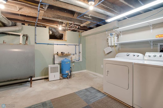 604 2nd Ave S, Kindred, ND 58052 - laundry room with separate washer and dryer and oil tank