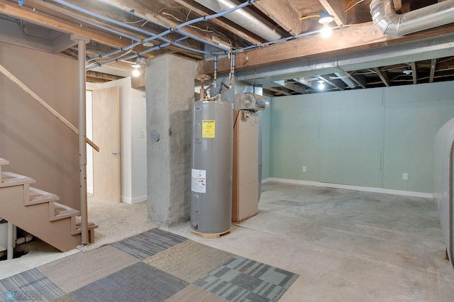 604 2nd Ave S, Kindred, ND 58052 - unfinished below grade area featuring electric water heater and stairway