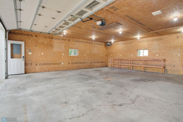 604 2nd Ave S, Kindred, ND 58052 - garage featuring a garage door opener