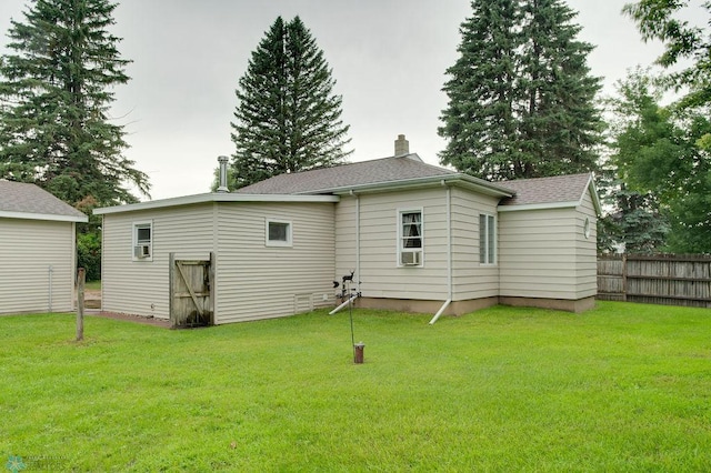 604 2nd Ave S, Kindred, ND 58052 - back of property featuring a chimney and roof with shingles