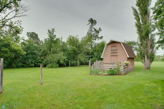 604 2nd Ave S, Kindred, ND 58052 - view of green lawn featuring a barn and an outbuilding