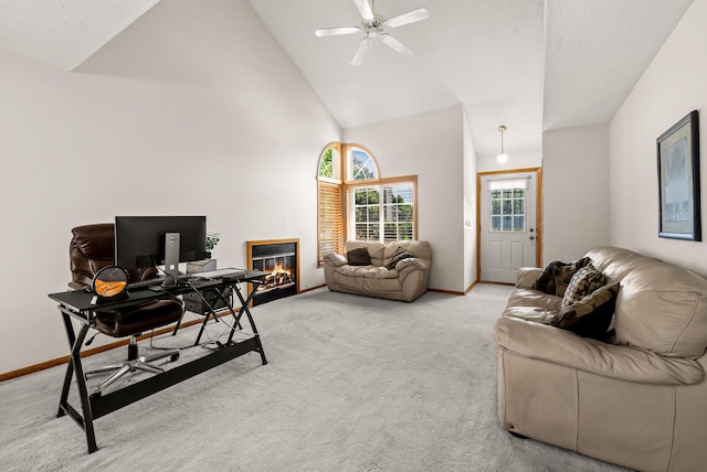 930 106th Ln NW Unit 9Nw, Coon Rapids, MN 55433 - office area with light colored carpet, high vaulted ceiling, a glass covered fireplace, and ceiling fan